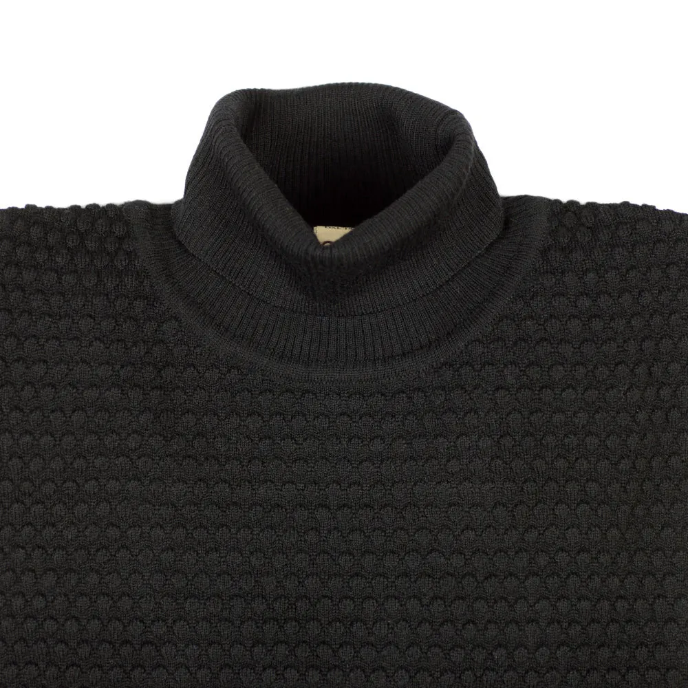 Black rollneck bubble stitch merino wool sweater